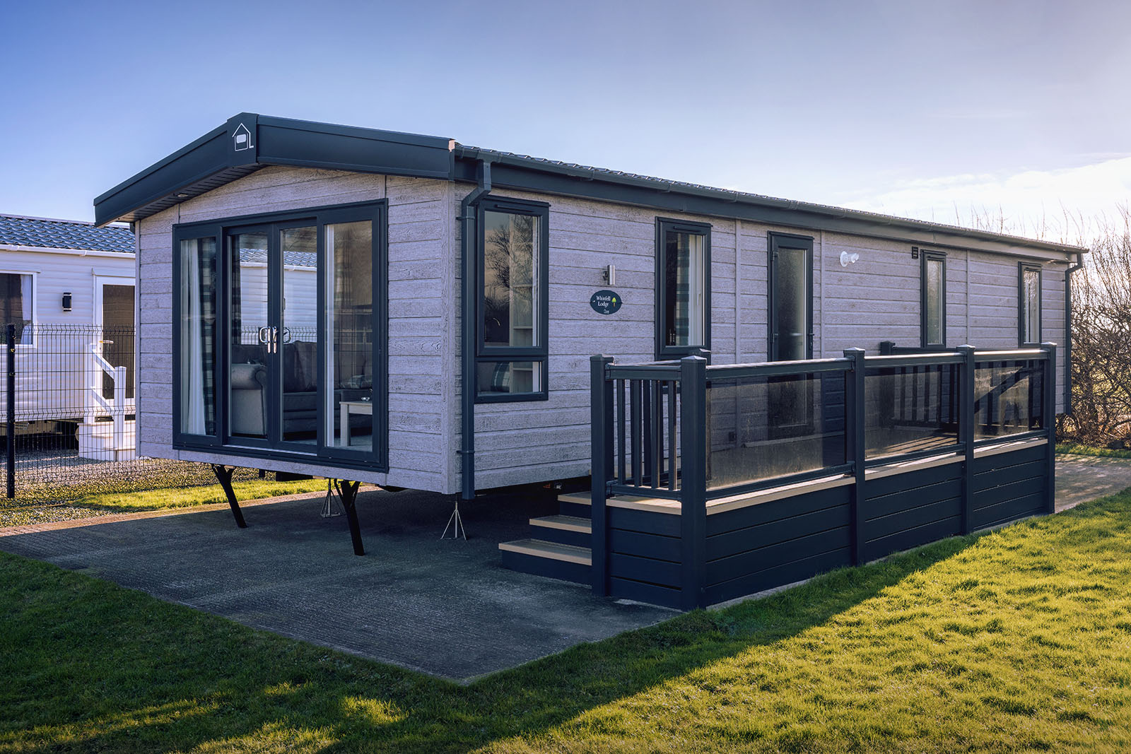 Whinfell Lodge caravan situated in a holiday park.